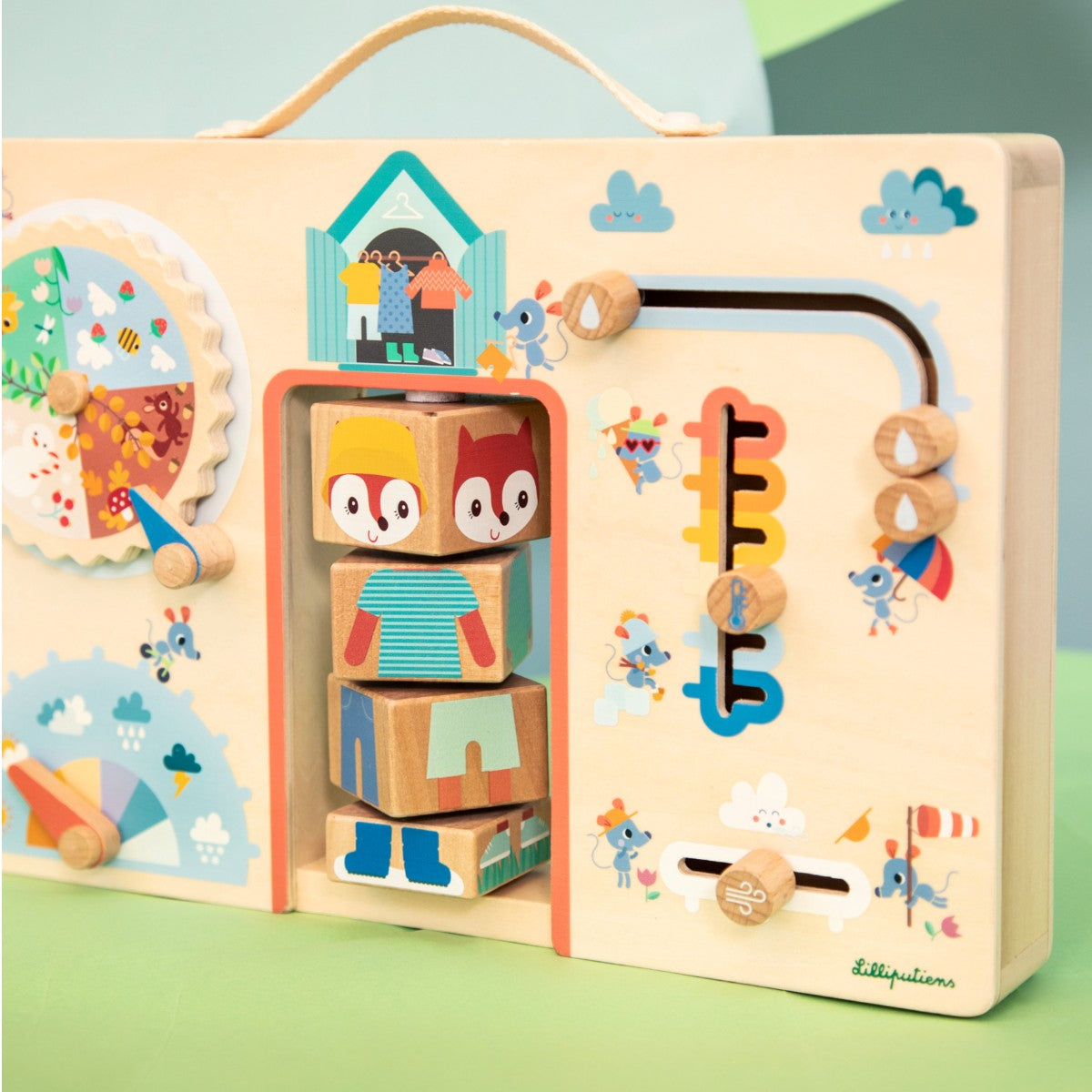 Lilliputiens aktivitetsbräda i trä, Kläder efter väder