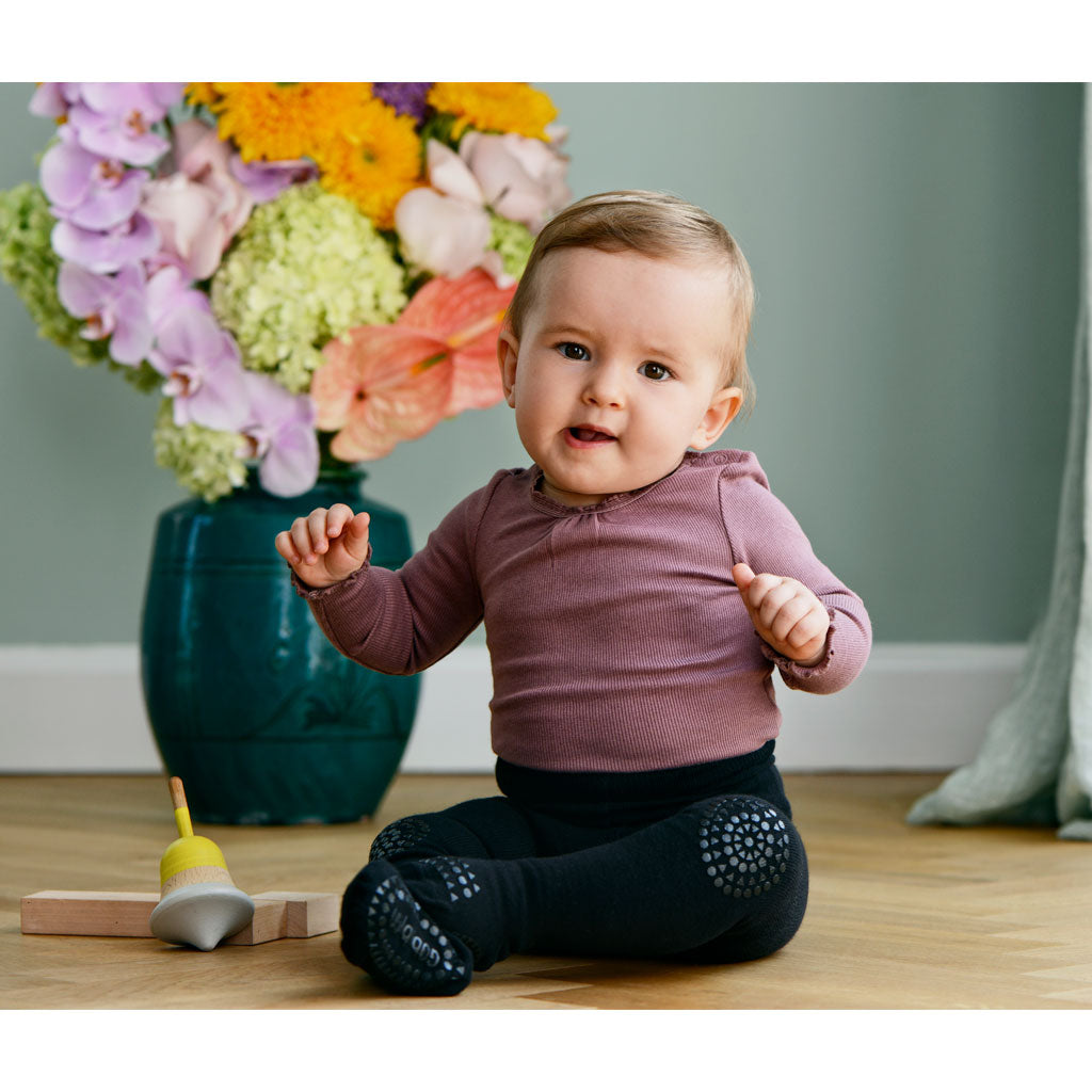 GoBabyGo kravlingsstrumpbyxa med gummiduttar, svart