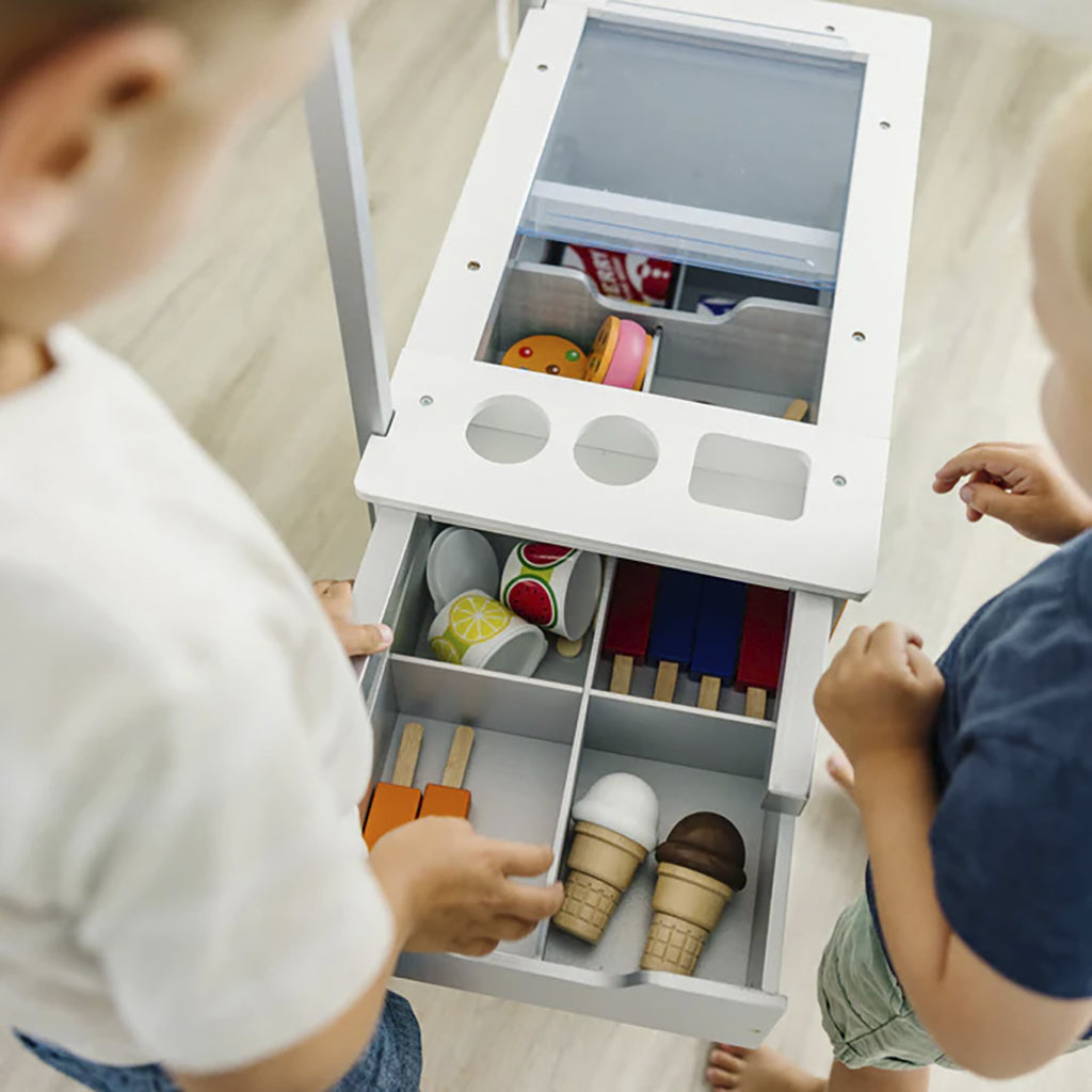 Melissa &amp; Doug Matvagn med innehåll