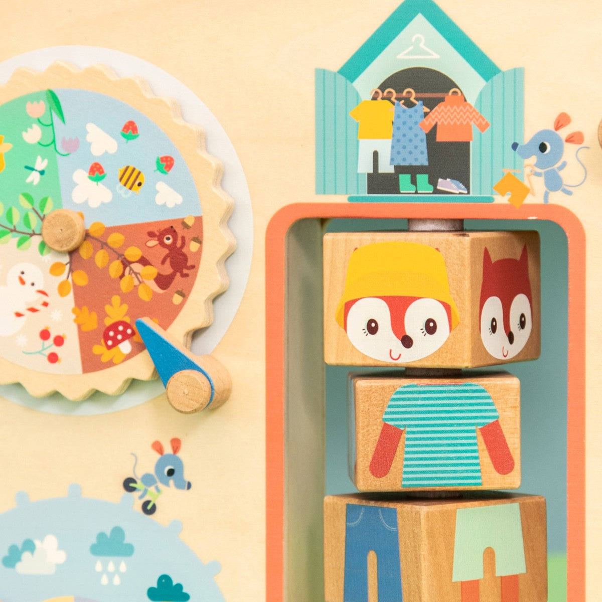 Lilliputiens aktivitetsbräda i trä, Kläder efter väder