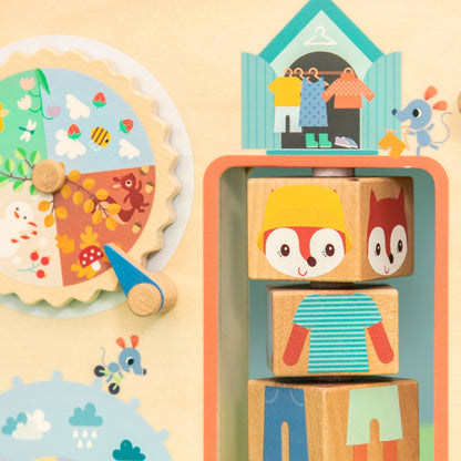 Lilliputiens aktivitetsbräda i trä, Kläder efter väder