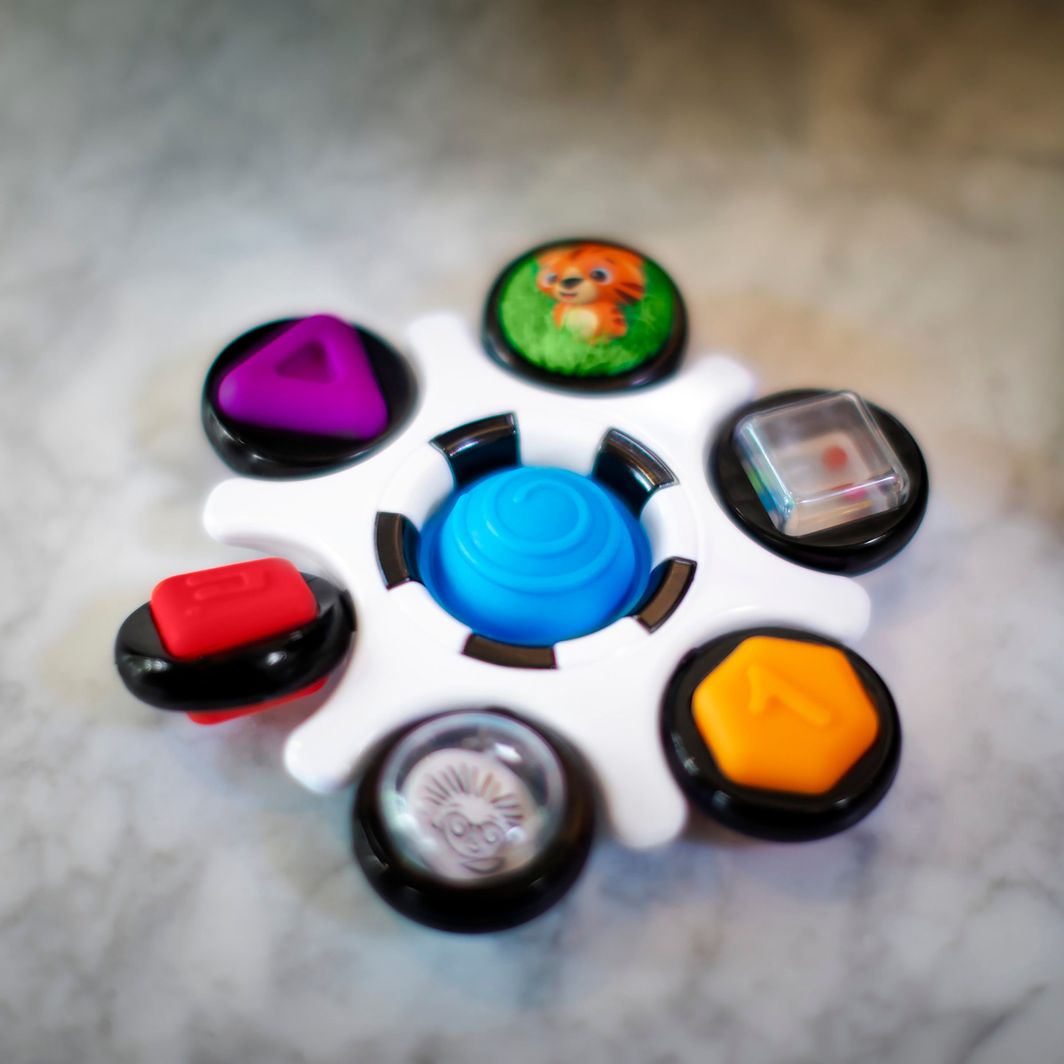 Baby Einstein Curiosity Clutch™ sensorisk leksak