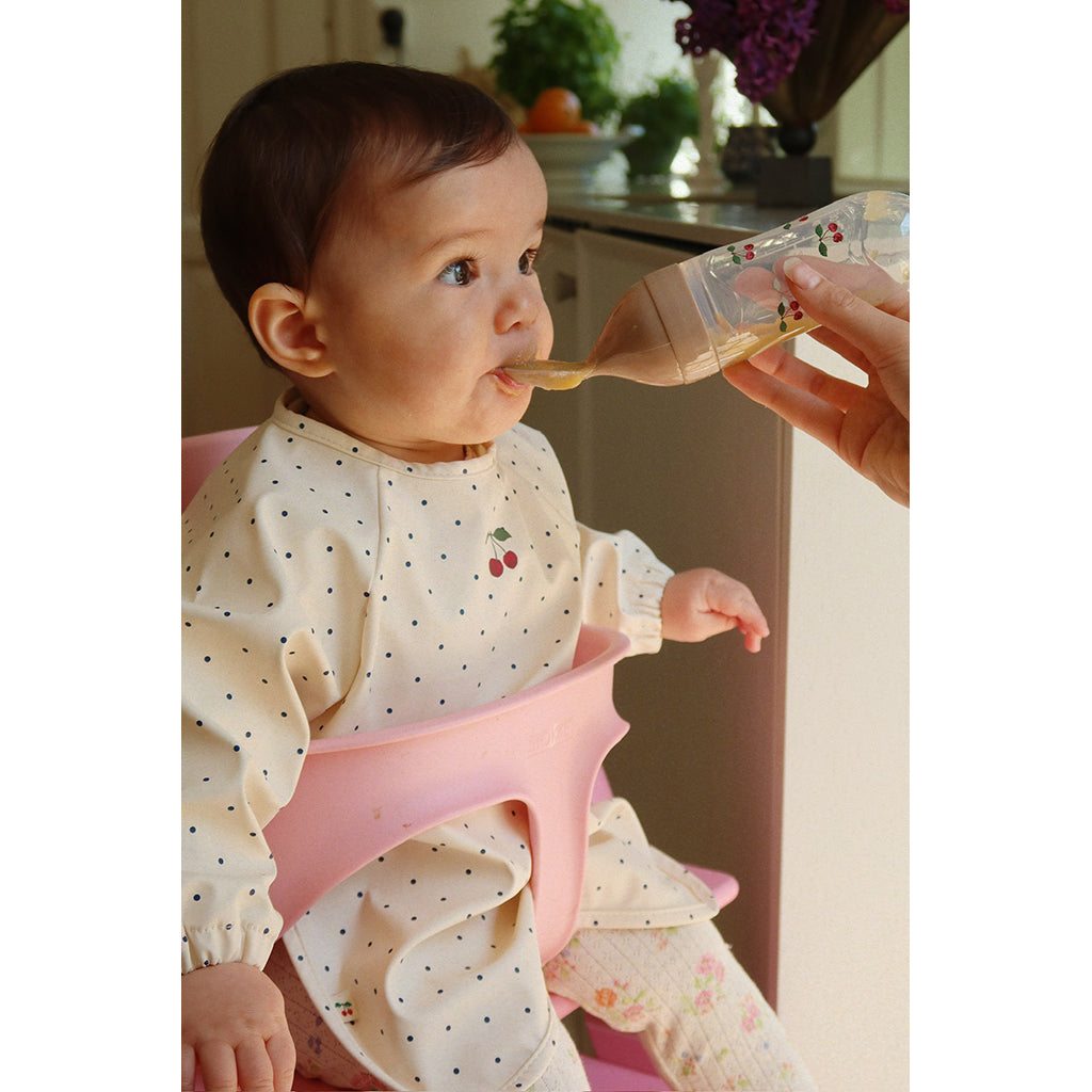 Konges Sløjd Dinner haklapp med ärmar, 6 mån.–3 år – Navy dot/Rain Washed