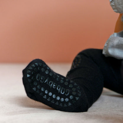GoBabyGo kravlingsstrumpbyxa med gummiduttar, svart